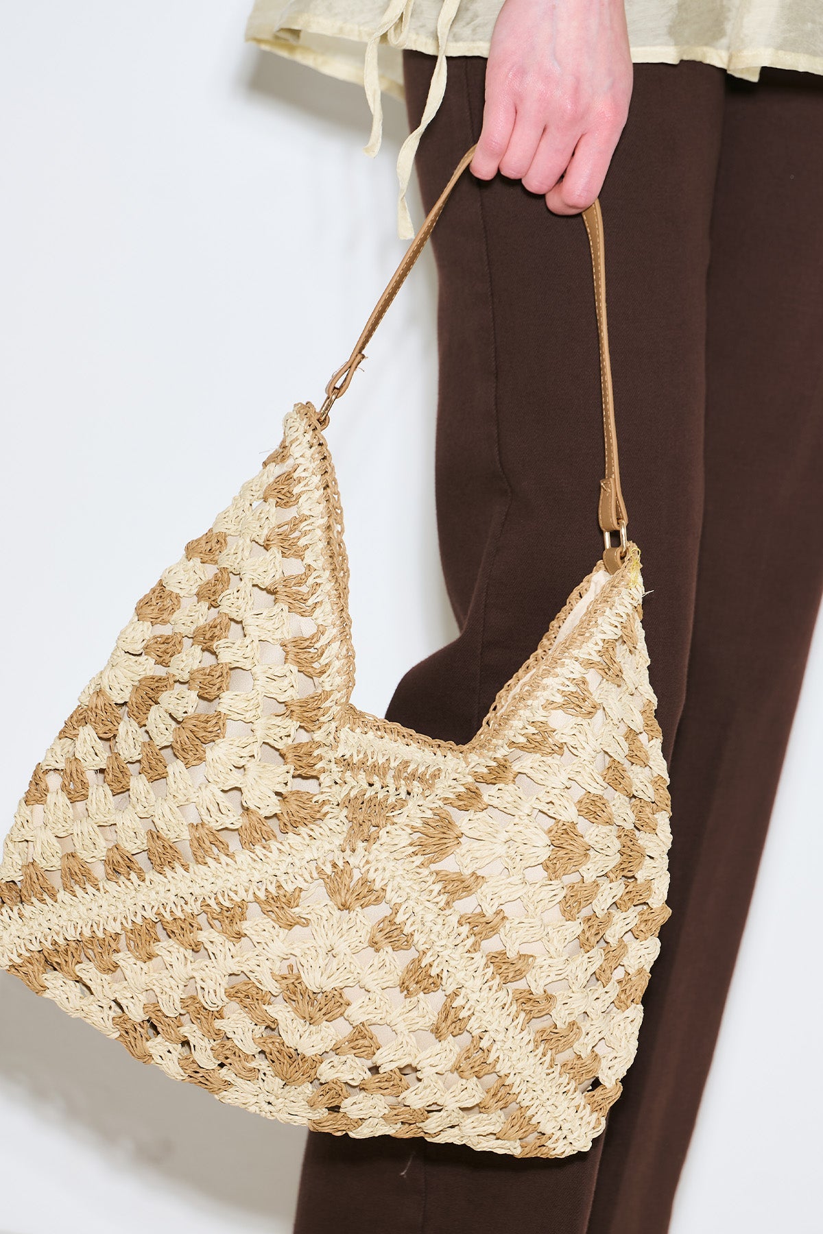 Beige patterned straw handbag with snap closure and inner pocket, view 6