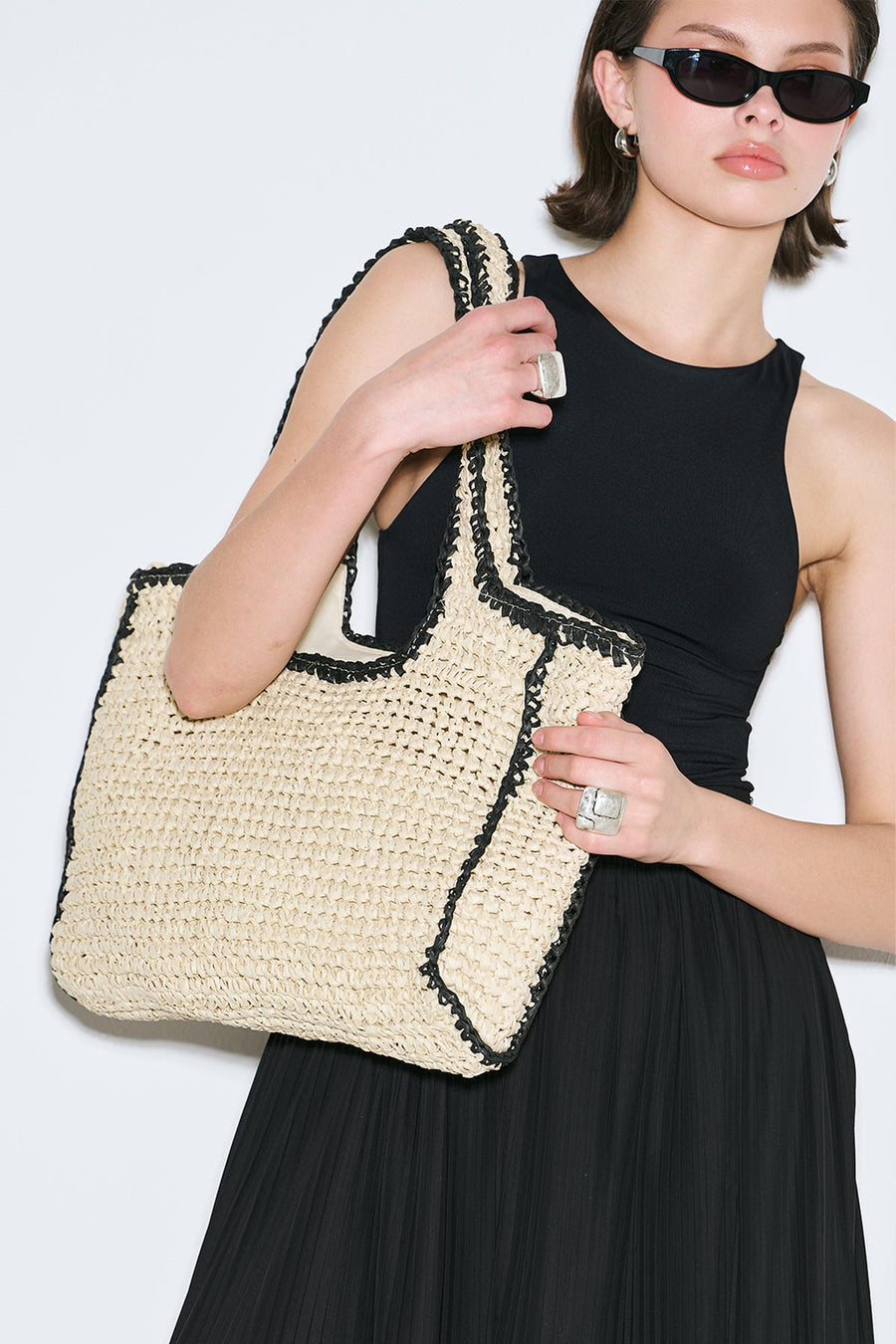 Large beige and black striped straw shoulder bag with zipper closure, view 1