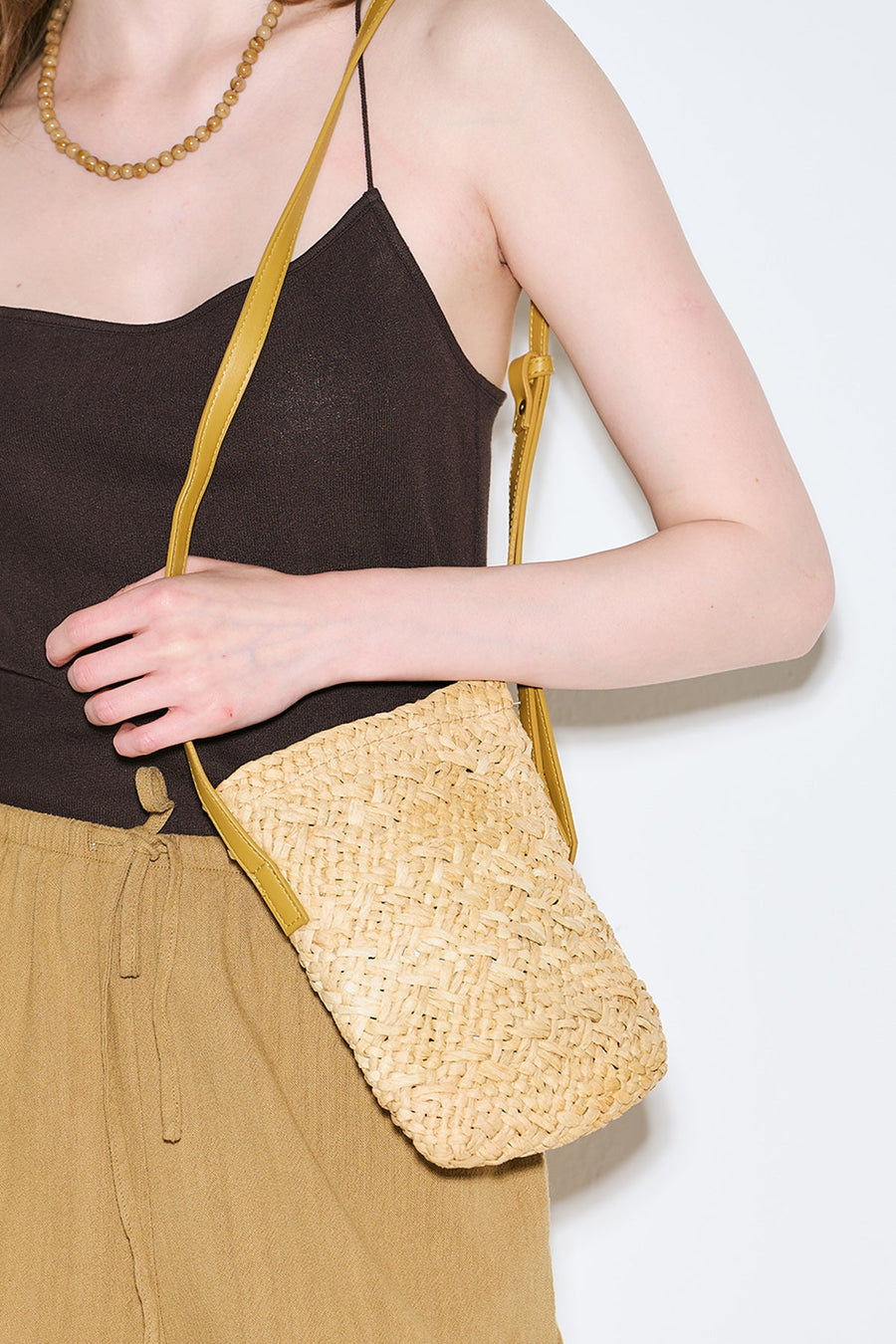 Beige mini straw basket bucket bag with drawstring closure, view 2
