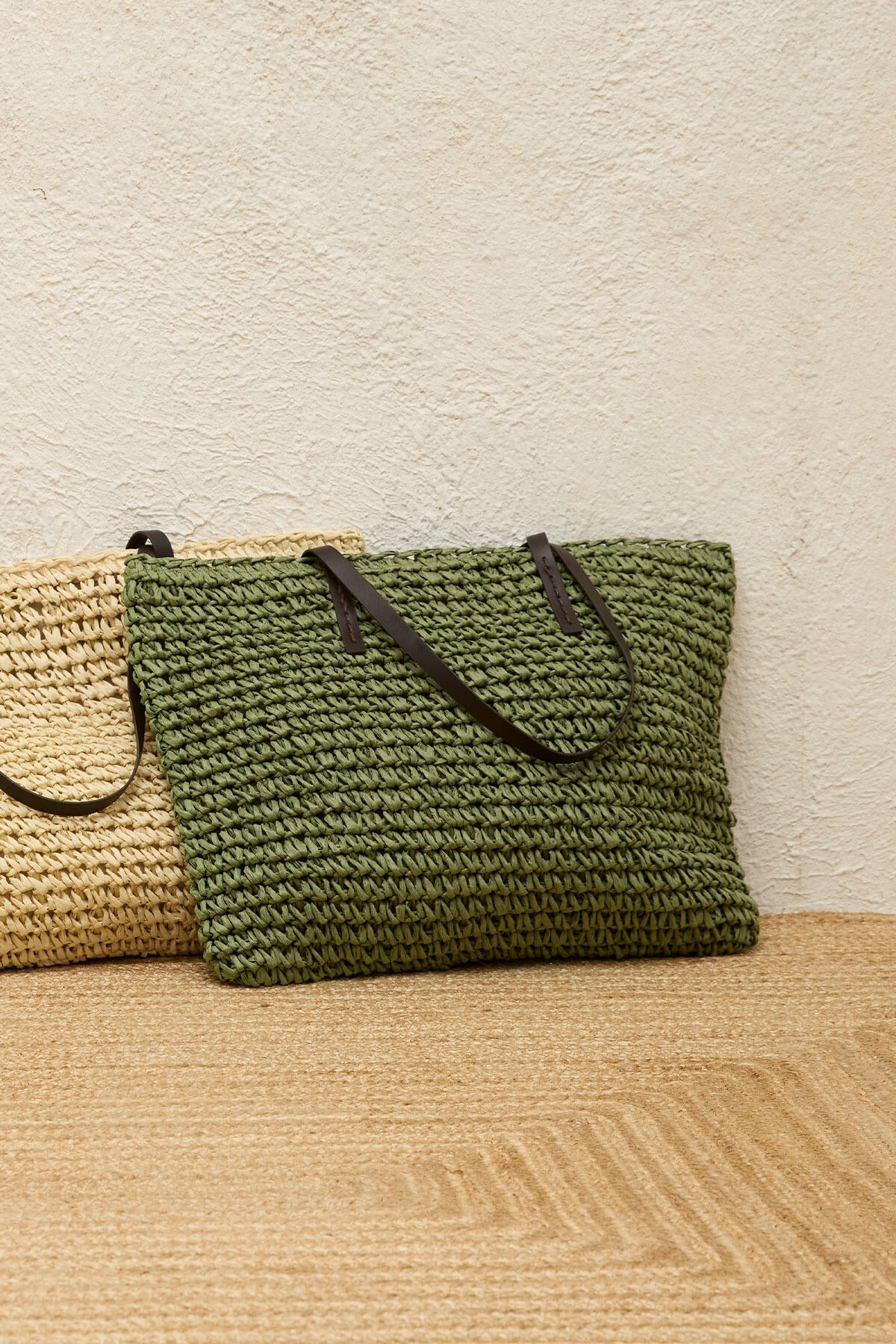 Green woven straw shoulder bag with faux leather strap and zip closure, view 4