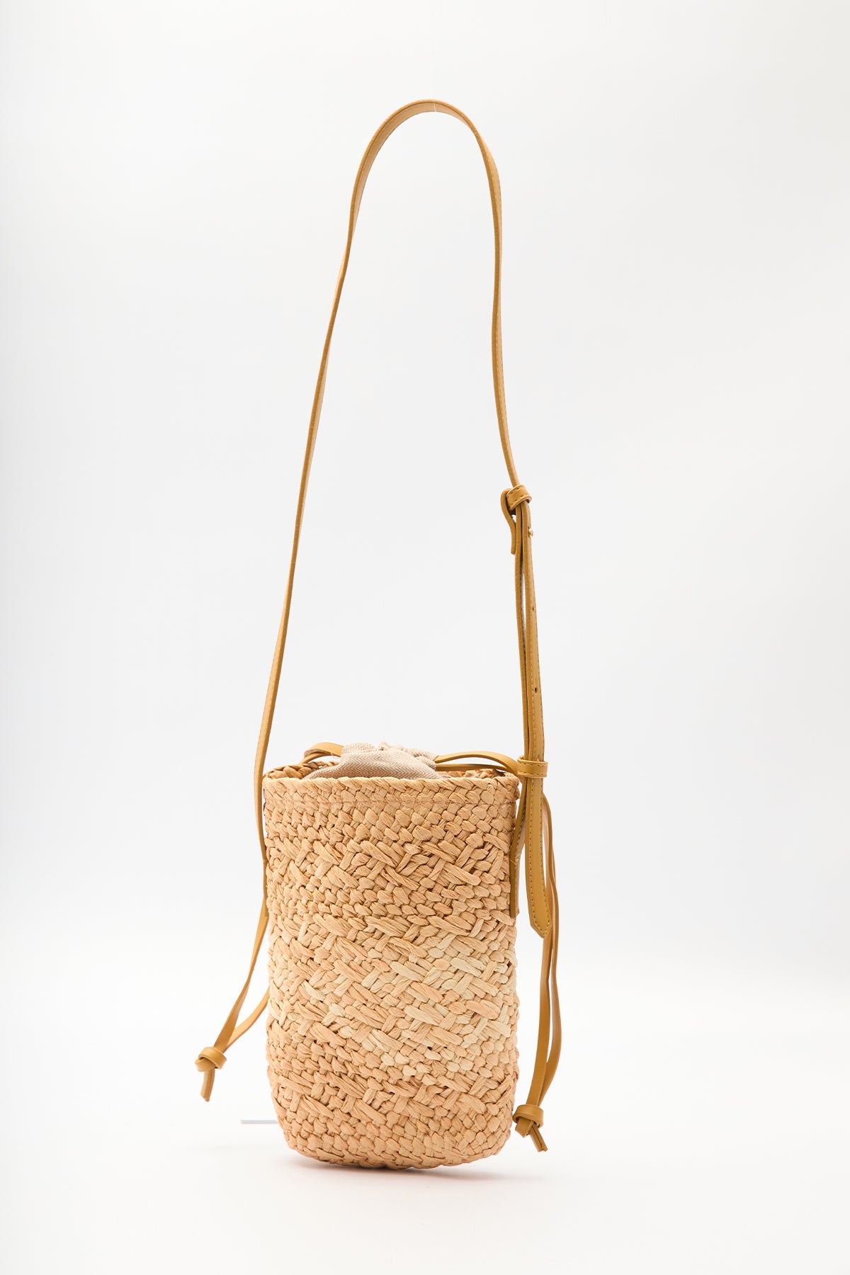 Beige mini straw basket bucket bag with drawstring closure, view 4