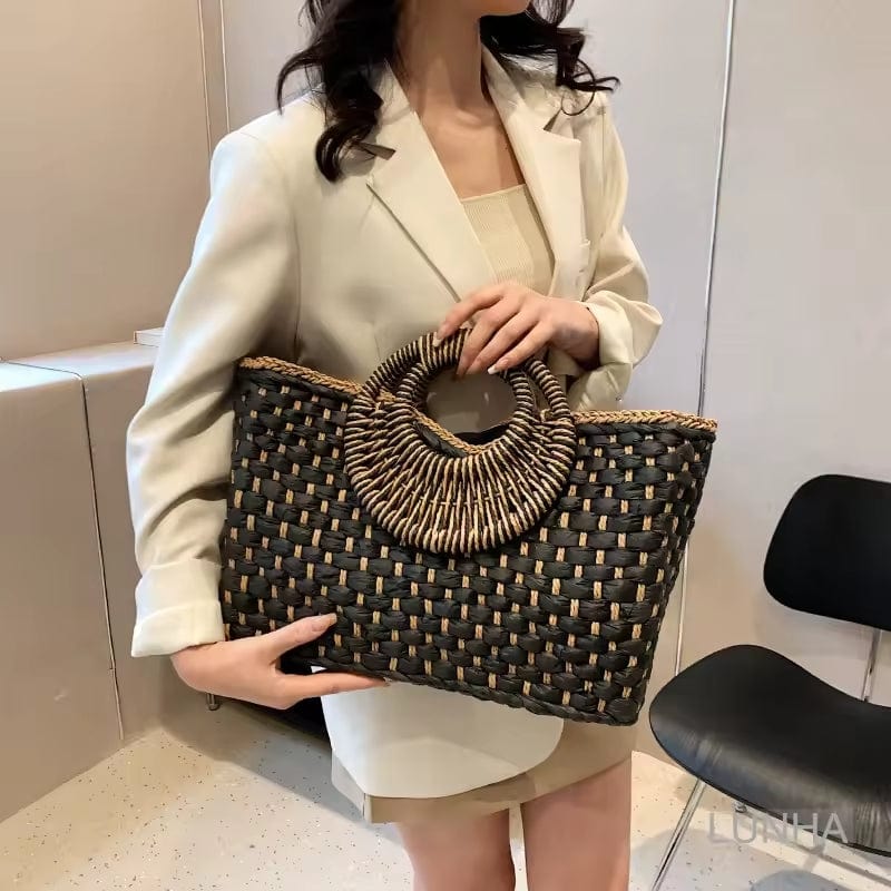 Straw Summer Bag for Women, Natural Summer Vacation Purse in Black, styled as a SheSelects summer accessory