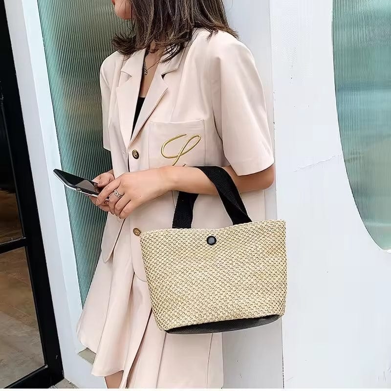 Small Raffia Summer Bag for Women, Natural Summer Vacation Purse in Black, styled as a SheSelects summer accessory