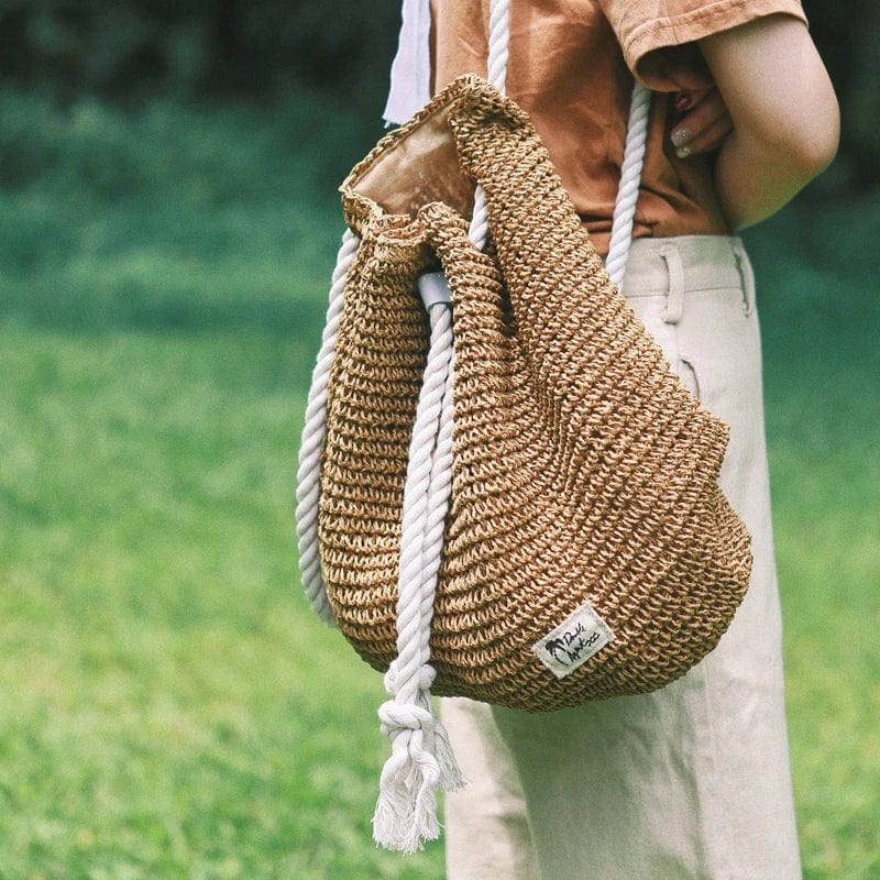 Straw Bucket Bag for Women, Boho Summer Vacation Purse in Black, styled as a SheSelects summer accessory