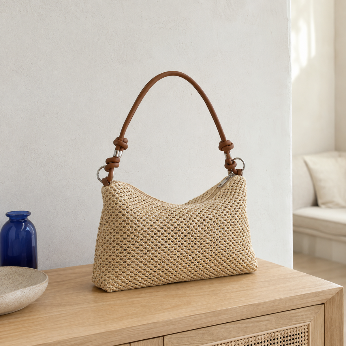 Natural woven straw hobo bag with white knotted shoulder handle