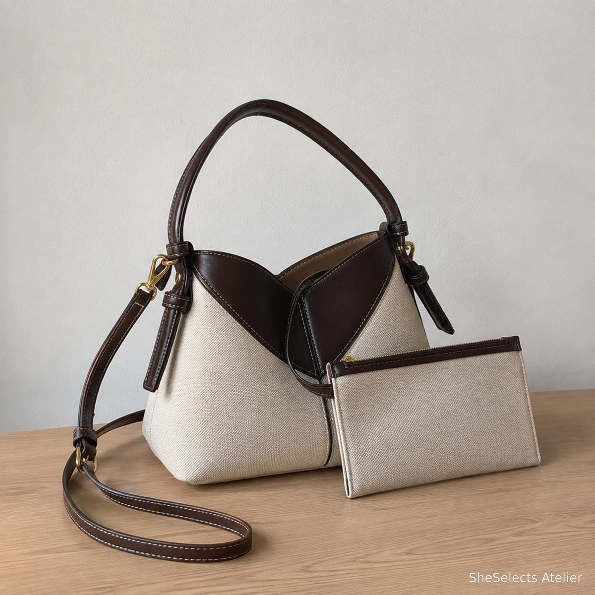 Beige canvas and brown vegan leather hobo bag with matching pouch