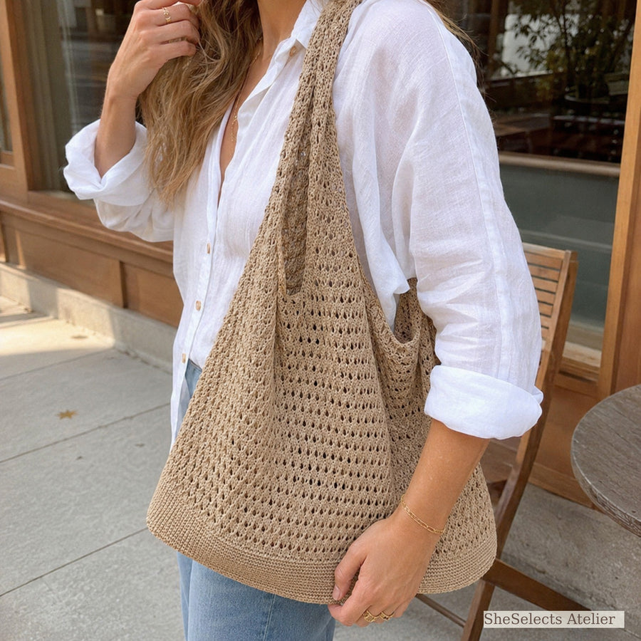 Khaki hollow knit shoulder tote worn with a white linen outfit