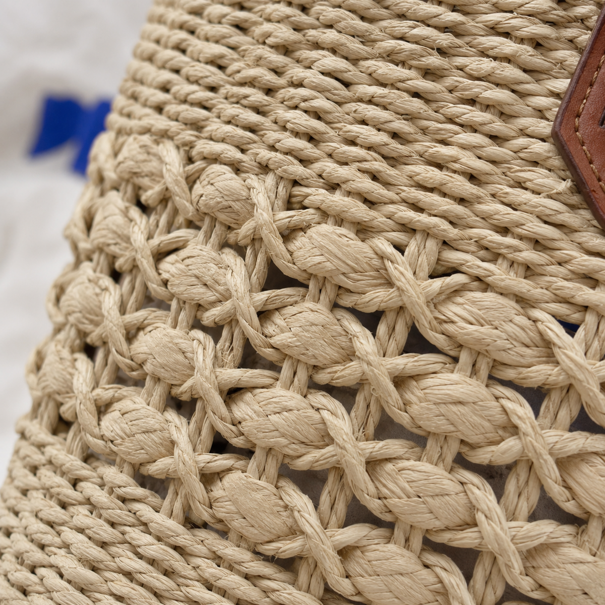 Close-up of the dense and open lattice paper-straw weave