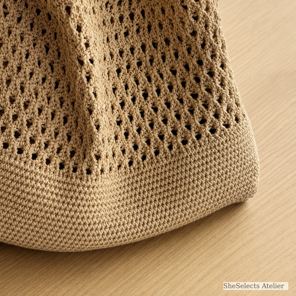 Close-up of khaki knit tote base and dense ribbed bottom band
