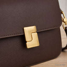 Sac bandoulière en cuir véritable structuré avec fermoir tournant