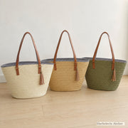 Beige, light brown and army green woven tote bags together