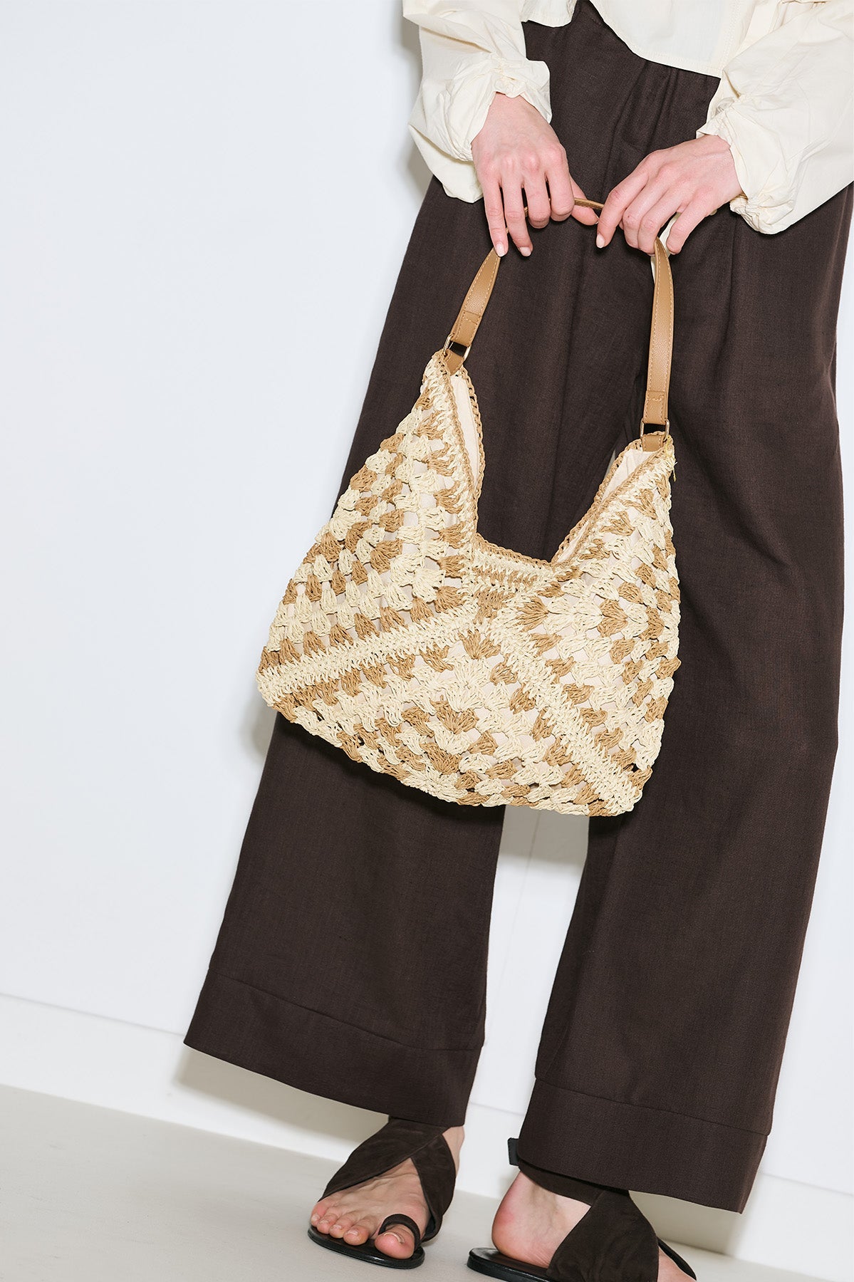 Beige patterned straw handbag with snap closure and inner pocket, view 3