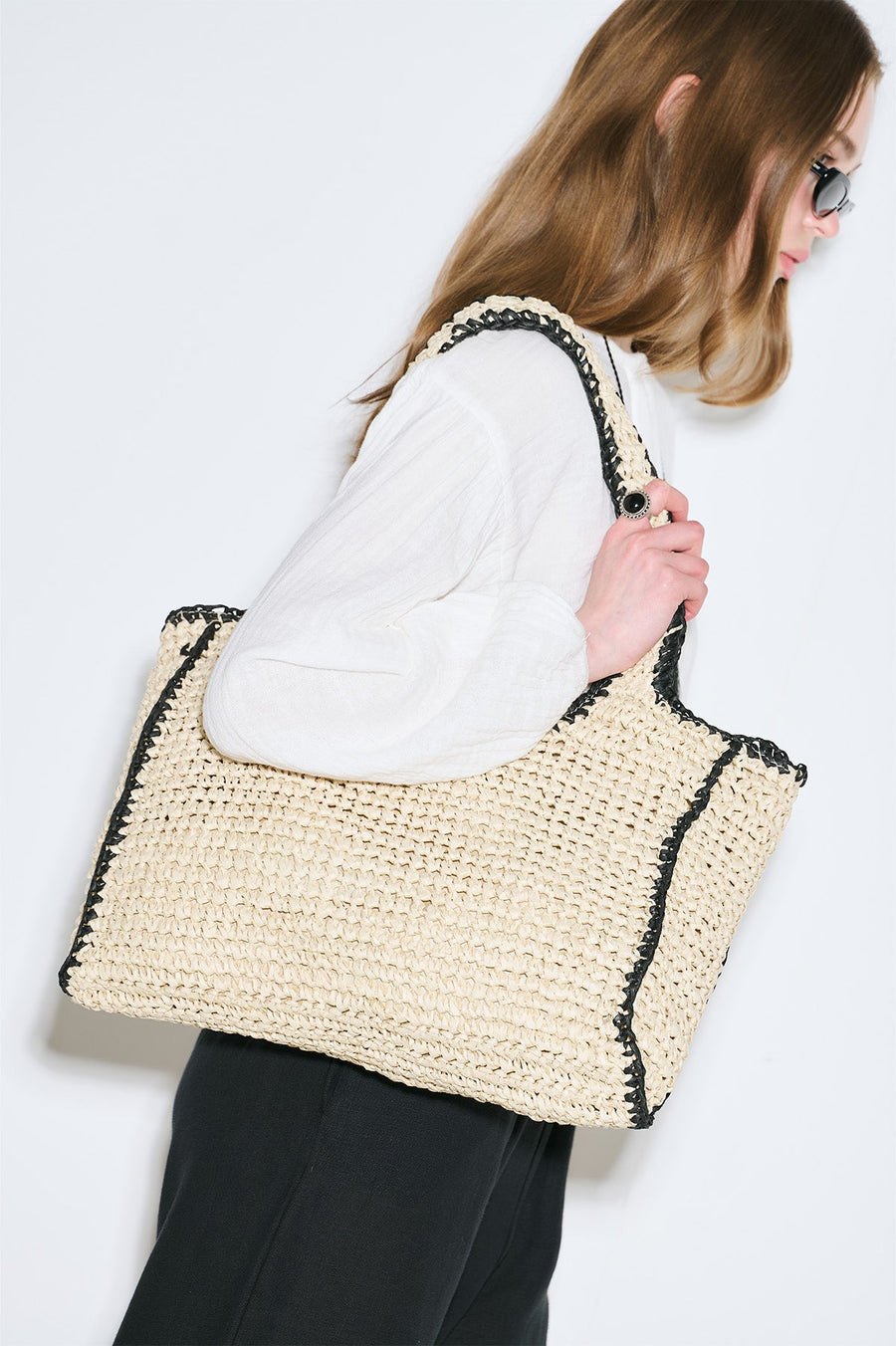 Large beige and black striped straw shoulder bag with zipper closure, view 2