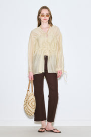 Beige patterned straw handbag with snap closure and inner pocket, view 4