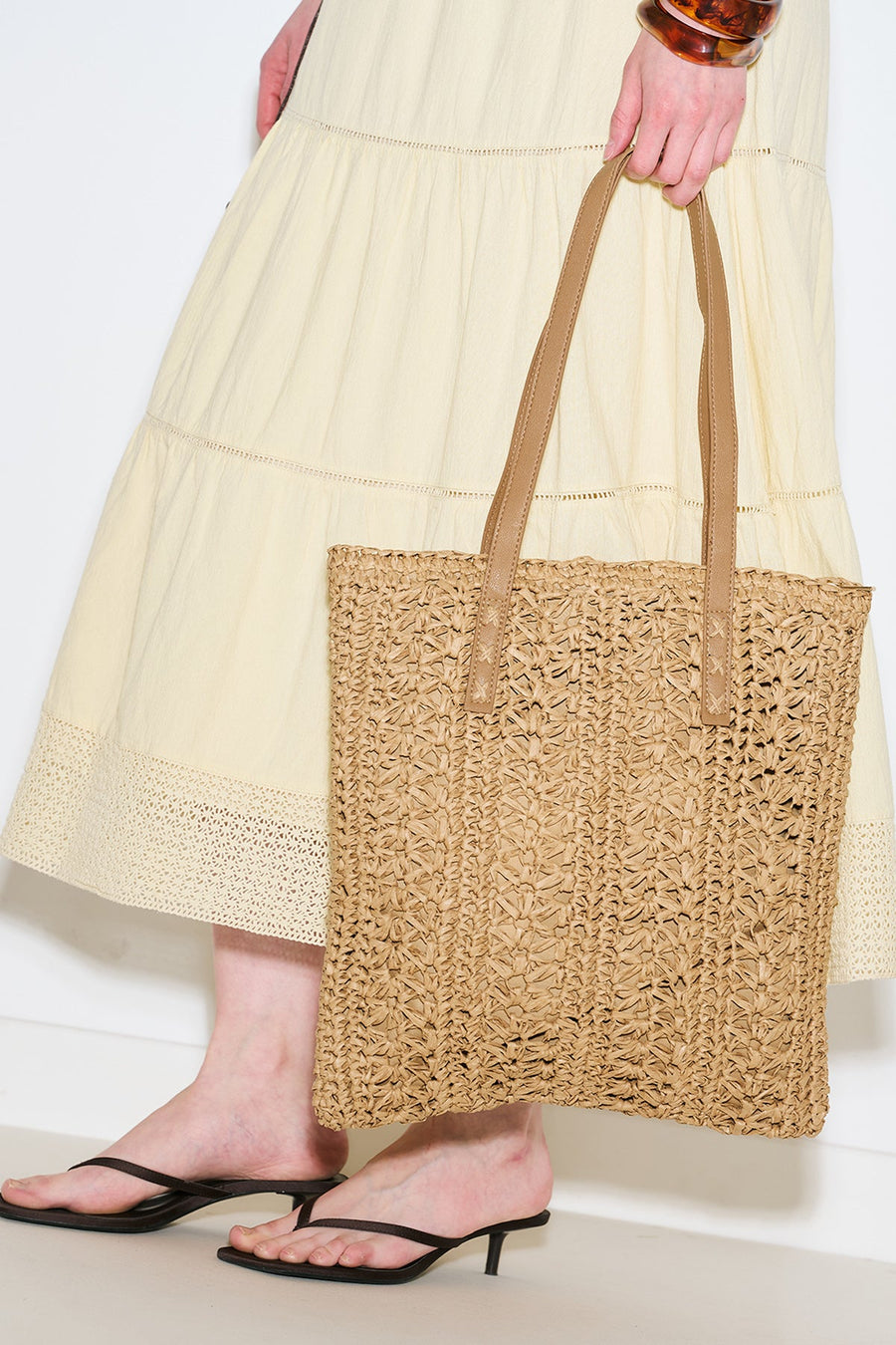 Natural patterned straw shoulder bag with faux leather straps, view 1