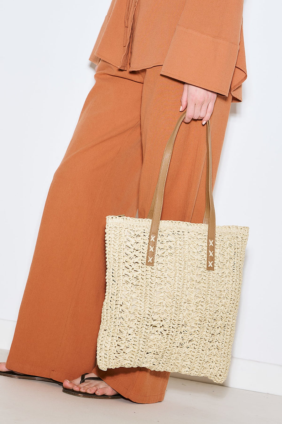 Beige patterned straw shoulder bag with faux leather straps, view 2