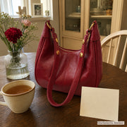 Red retro hobo purse styled as a thoughtful gift for her