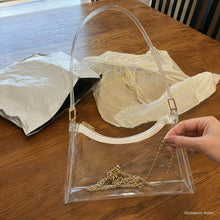 Transparente PVC-Schultertasche mit Leder- oder goldfarbenem Kettenriemen