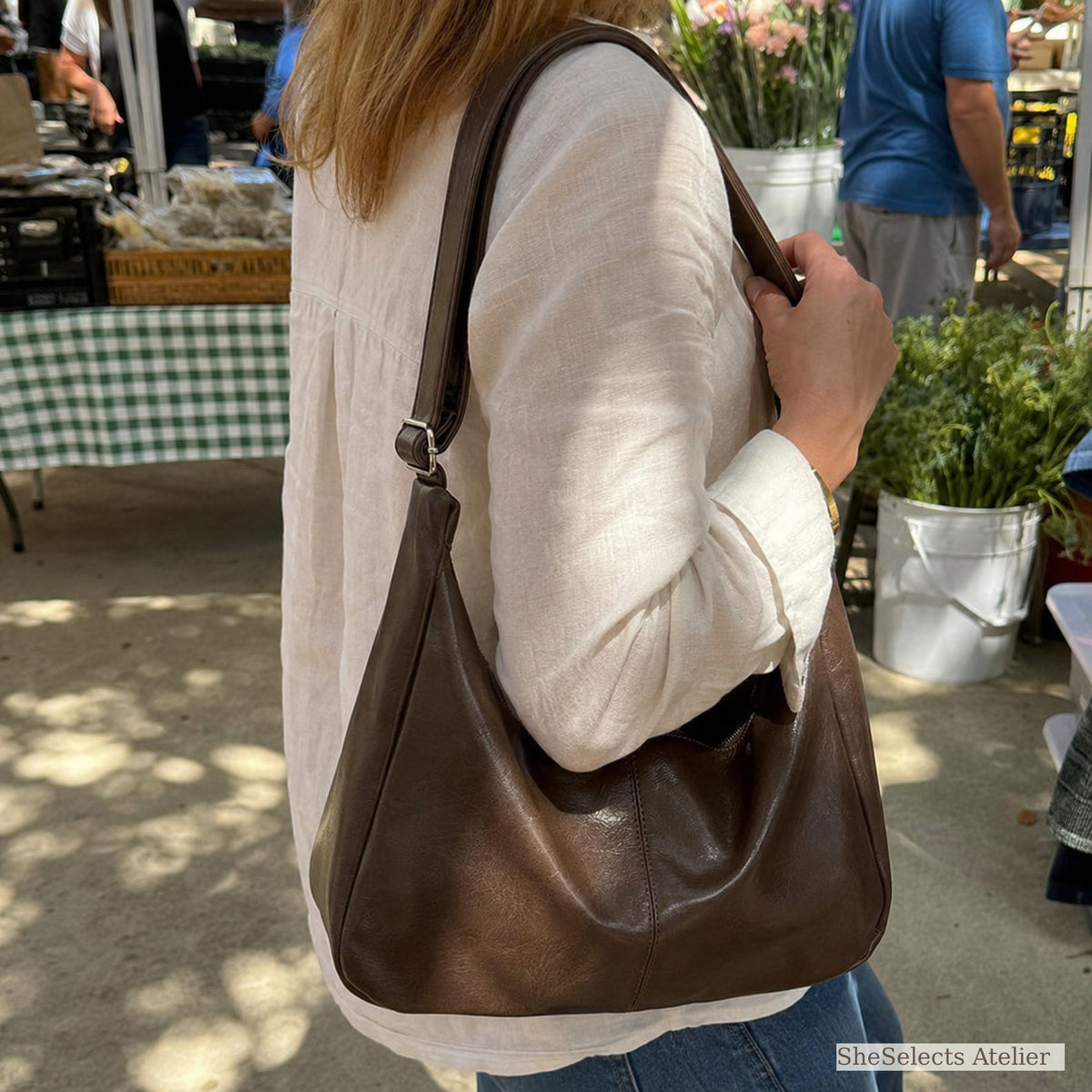 Natural outdoor customer photo with the brown hobo bag