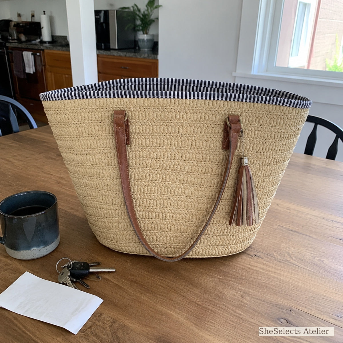 Customer home photo of a light brown woven tote on a table