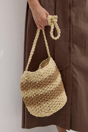 Beige striped straw mini crossbody bag with tassel details, view 4
