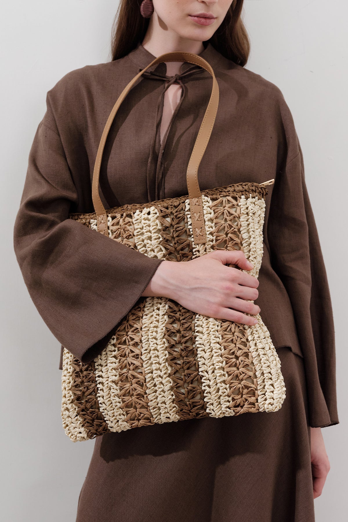 Beige striped straw shoulder bag with faux leather strap, view 2