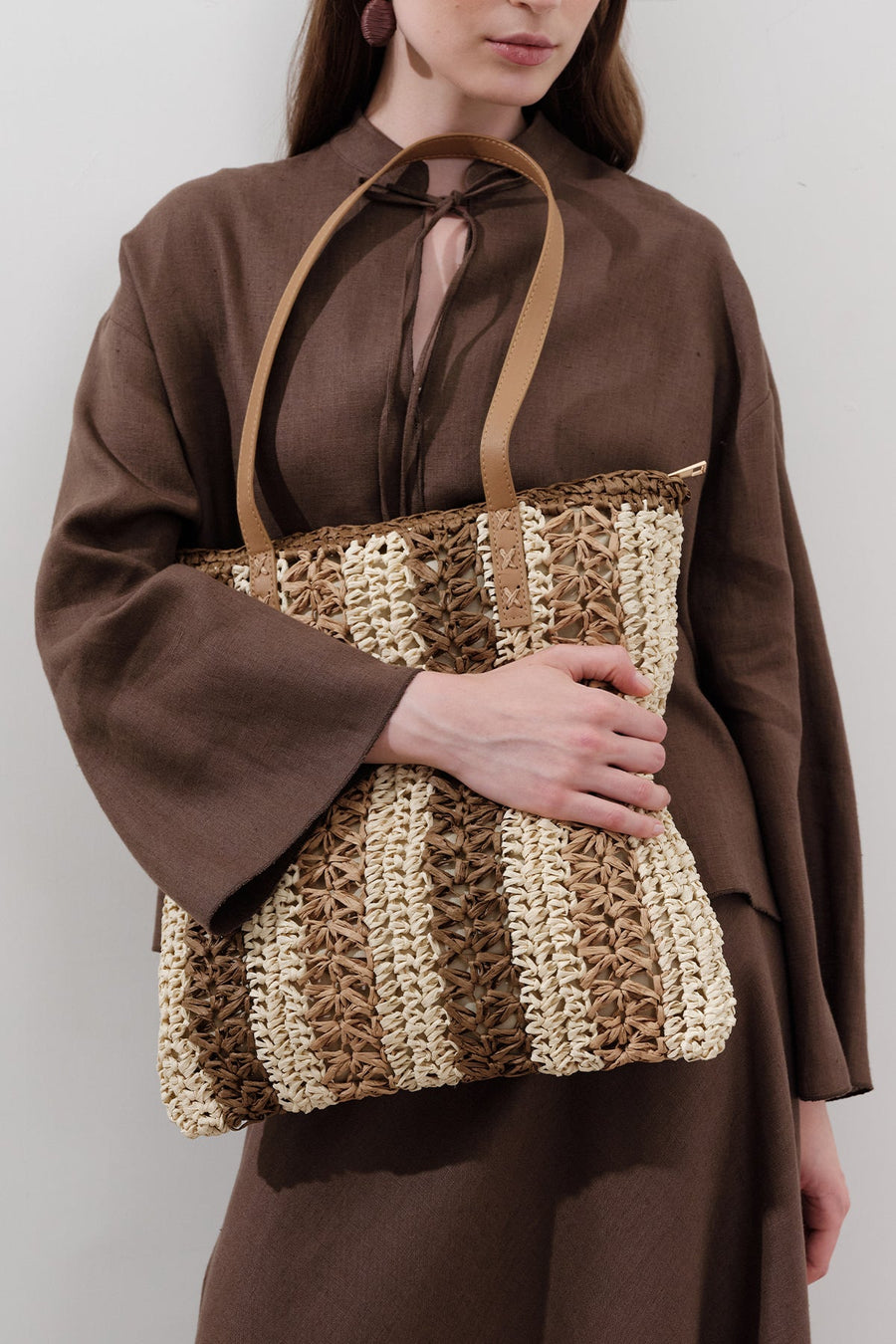 Beige striped straw shoulder bag with faux leather strap, view 2
