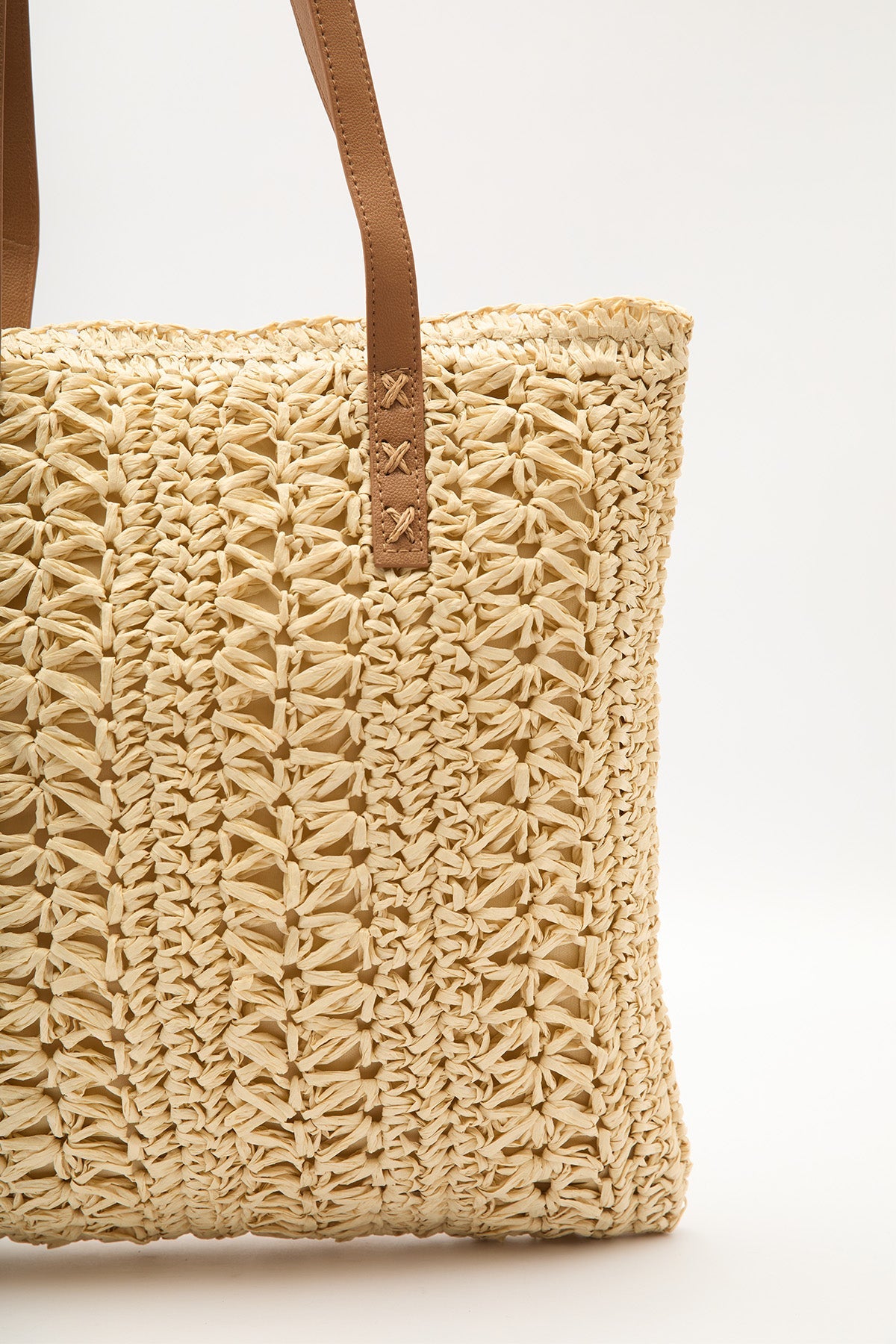 Beige patterned straw shoulder bag with faux leather straps, view 4
