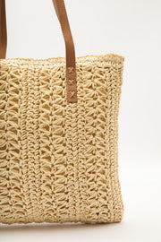Beige patterned straw shoulder bag with faux leather straps, view 4