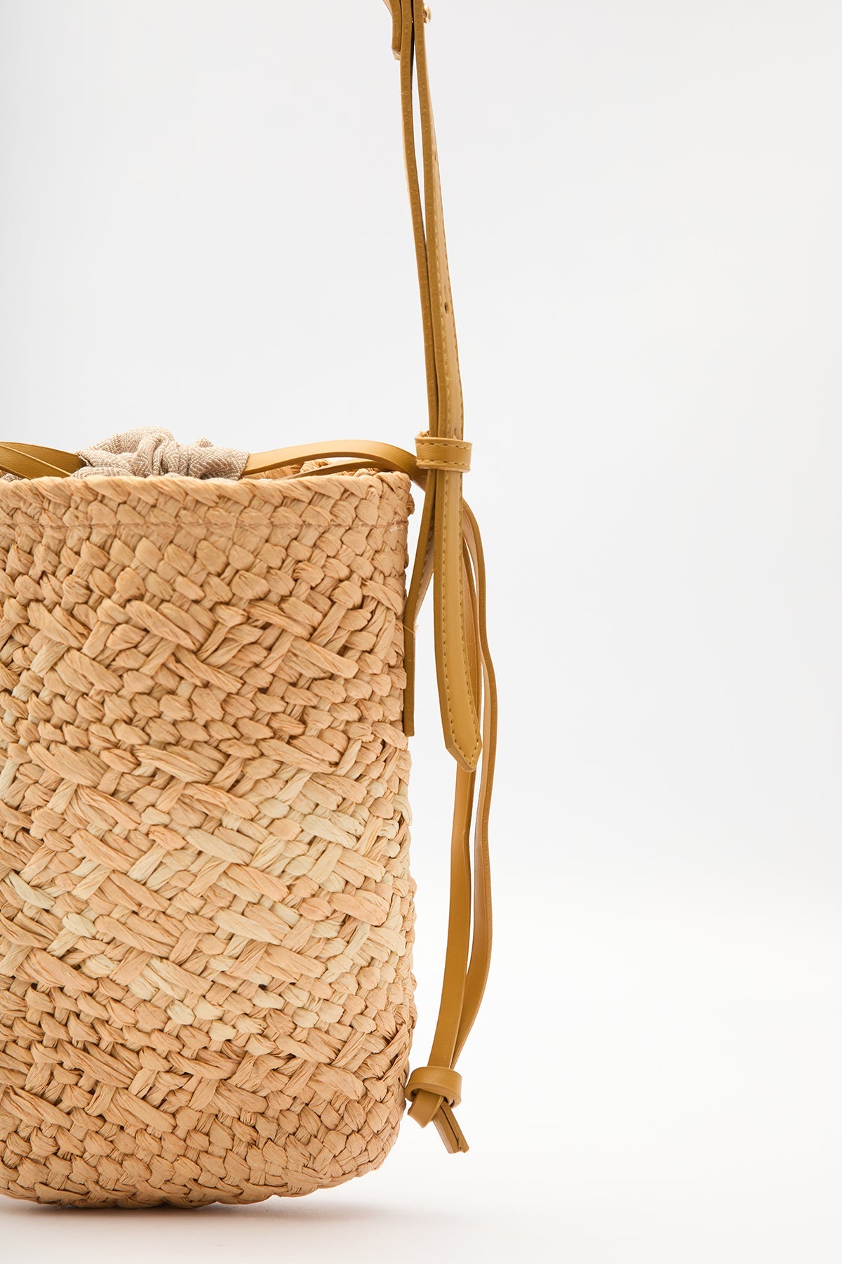 Beige mini straw basket bucket bag with drawstring closure, view 5
