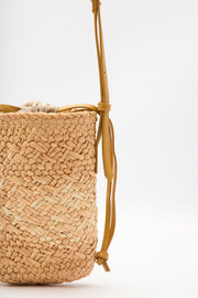 Beige mini straw basket bucket bag with drawstring closure, view 5
