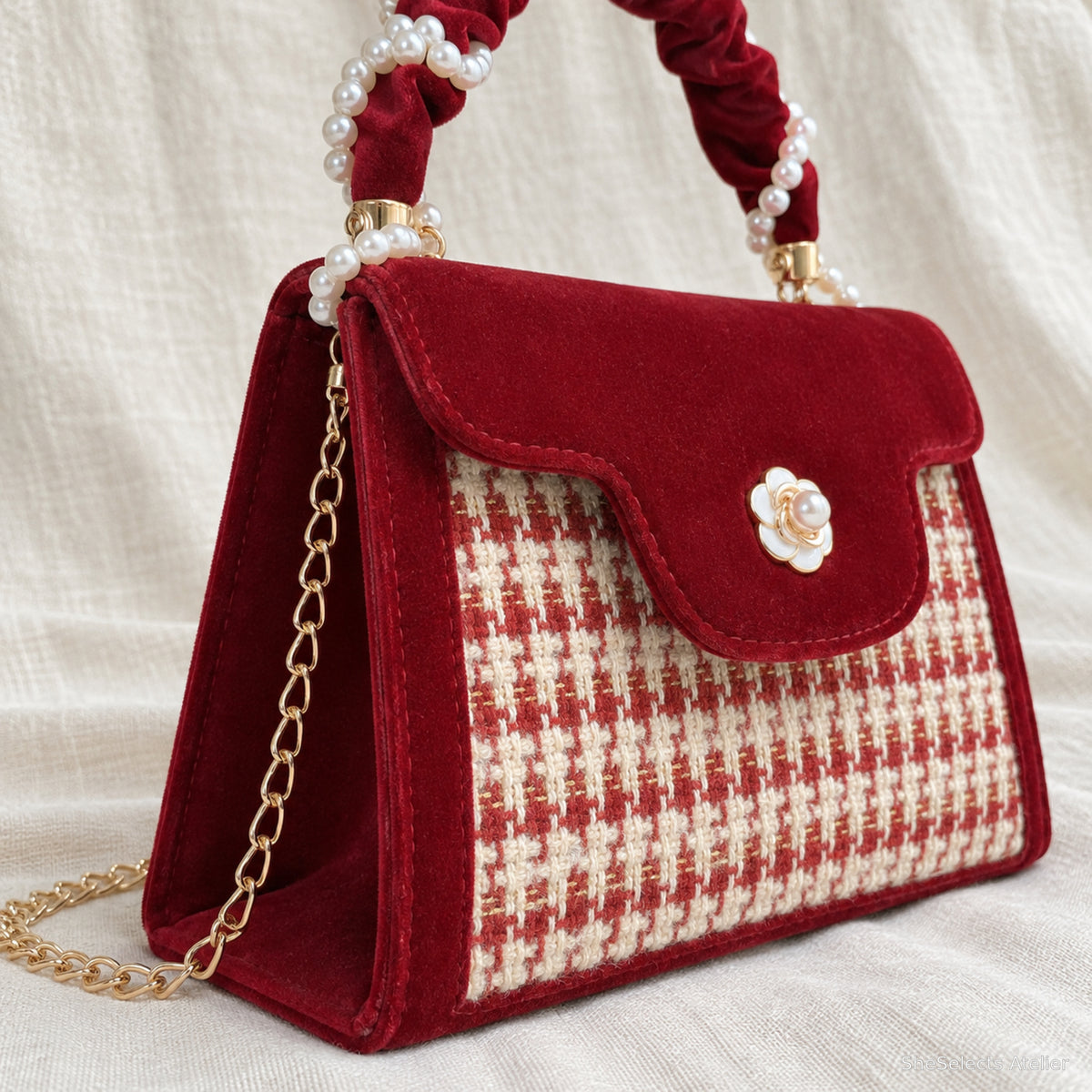 Wine red velvet structured side gusset close up