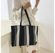 Black Raffia Summer Bag for Women, Natural Summer Vacation Purse in Black, styled as a SheSelects summer accessory