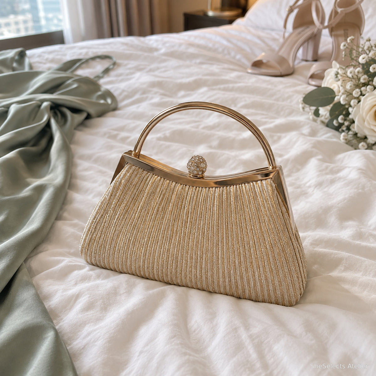 Celestine Gold pleated evening bag in a bridal suite