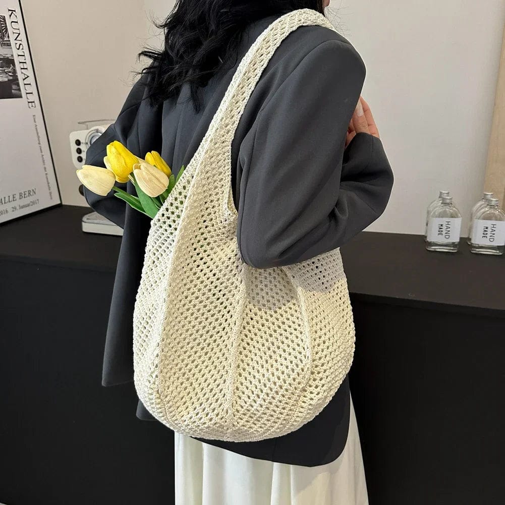 Crochet Tote Bag for Women, Woven Summer Beach and Vacation Purse in Black, styled as a SheSelects summer accessory