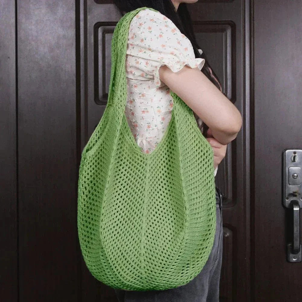 Crochet Tote Bag for Women, Woven Summer Beach and Vacation Purse in Black, styled as a SheSelects summer accessory