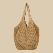 Crochet Tote Bag for Women, Woven Summer Beach and Vacation Purse in Black, styled as a SheSelects summer accessory
