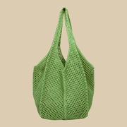Crochet Tote Bag for Women, Woven Summer Beach and Vacation Purse in Black, styled as a SheSelects summer accessory