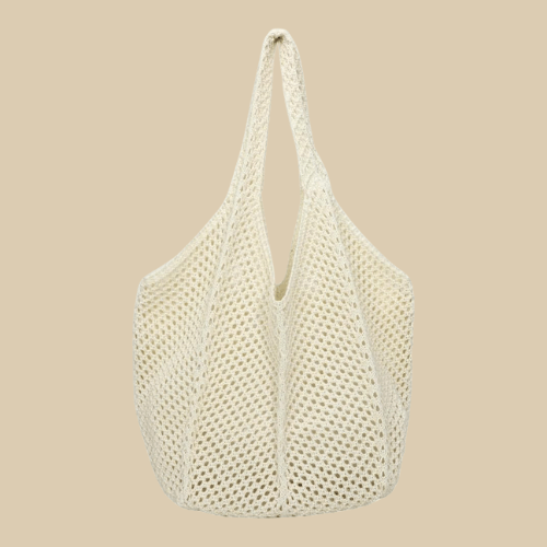 Crochet Tote Bag for Women, Woven Summer Beach and Vacation Purse in Black, styled as a SheSelects summer accessory