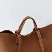 Vegan Leather Tote Bag for Women, Soft Everyday Shoulder Purse in Black, styled as a SheSelects summer accessory