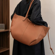 Vegan Leather Tote Bag for Women, Soft Everyday Shoulder Purse in Black, styled as a SheSelects summer accessory