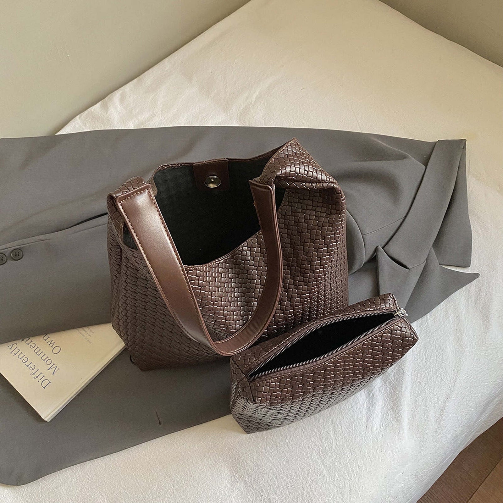 Brown woven hobo bag opened beside the exact matching tapered wedge zip pouch