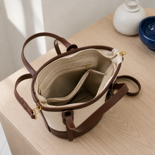 Strukturierte Canvas-Bucket-Bag mit Reißverschlussfächern und Crossbody-Riemen