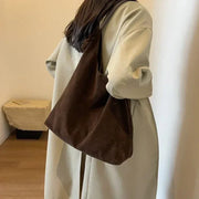 Suede Style Vegan Leather Hobo Bag for Women, Slouchy Everyday Shoulder Purse in Coffee, styled as a SheSelects summer accessory