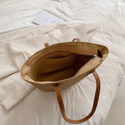 Large Straw Tote Bag for Women, Woven Summer Beach and Vacation Purse in Beige, styled as a SheSelects summer accessory
