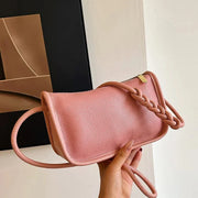 Vegan Leather Clutch Bag for Women, Evening and Wedding Purse in Black, styled as a SheSelects summer accessory