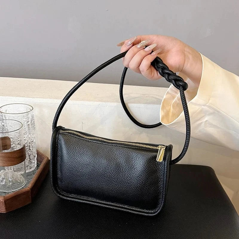 Vegan Leather Clutch Bag for Women, Evening and Wedding Purse in Black, styled as a SheSelects summer accessory