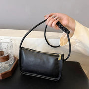Vegan Leather Clutch Bag for Women, Evening and Wedding Purse in Black, styled as a SheSelects summer accessory