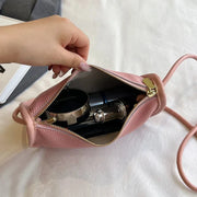 Vegan Leather Clutch Bag for Women, Evening and Wedding Purse in Black, styled as a SheSelects summer accessory