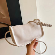 Vegan Leather Clutch Bag for Women, Evening and Wedding Purse in Black, styled as a SheSelects summer accessory